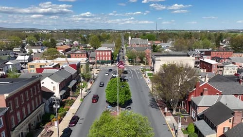 Small Town America Aerial With Waving Flag