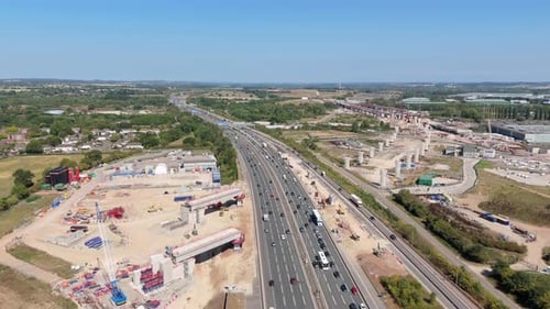 Aerial View of Busy Highway and Construction Site