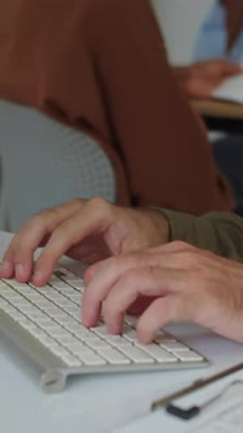 Hands of Developer Programming Code on Computer