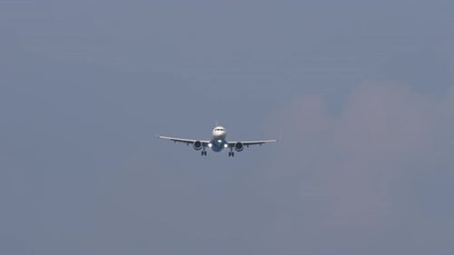 Jet Aircraft Flying Low Before Landing