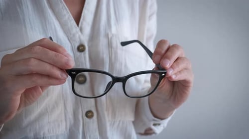 Female Eyesight Check Up with Glasses Indoor