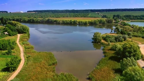 Rising over the beautiful small river in the countryside crossed by the road.