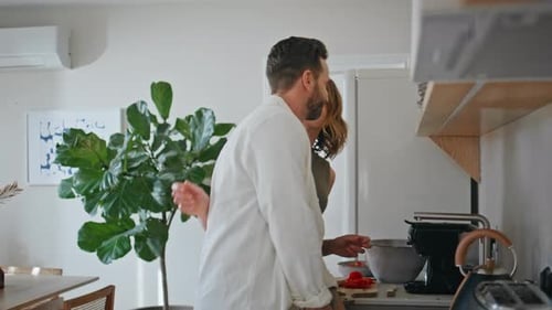 Loving Couple Cooking Together in the Kitchen