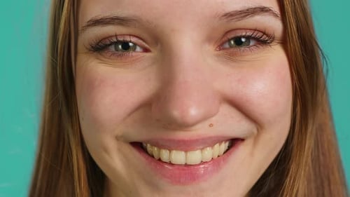 Extreme Close Up Shot of Cheerful Joyous Girl Smiling