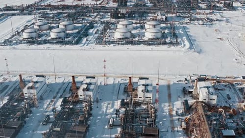 Breathtaking And Aerial View Snow Covered Mountains And Factories
