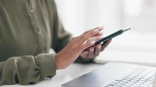 Close Up of Woman Using Smartphone at Desk