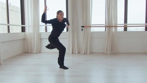 Girl Performing Energetic Contemporary Dance in Studio