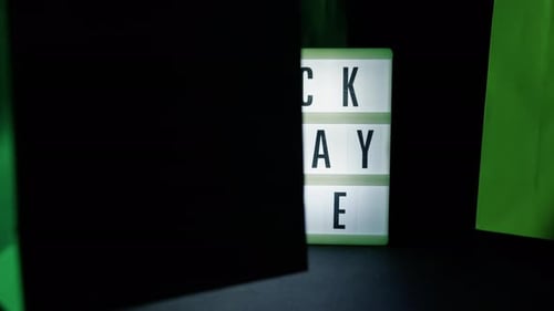 Black Friday Sale Advertising Sign With Colorful Bags