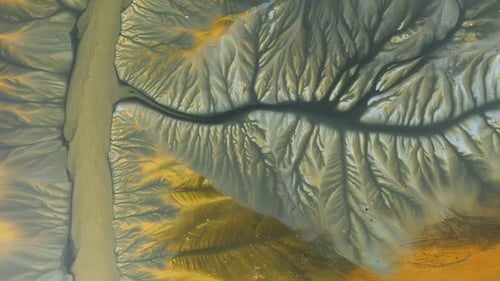 Aerial view of AMD acid mine drainage polluted waters. Natural pattern. Environmental pollution