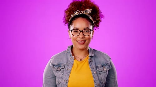 Happy, laughing and portrait of a beautiful woman isolated on a pink background in a studio