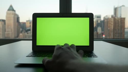 Computer Screen Isolated on GreenScreen Background Chroma Key in City Office