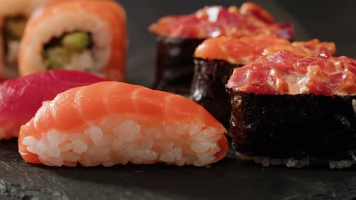 Sushi Sashimi Nigiri Platter Japanese Gunkan Maki Sushi Restaurant Fresh Tuna and Salmon Slices in