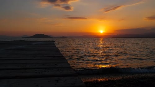 Sea Jetty with Nightfall Sun