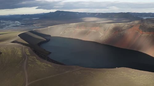 Aerial panning shot of spectacular Ljotipollur Volcano Crater Landscape in Iceland