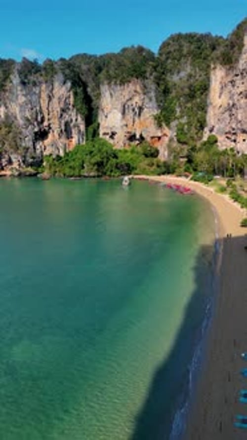 Explore the Stunning Beaches and Cliffs of Krabi Thailand During a Sunny Day