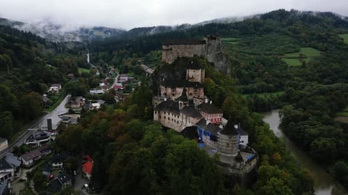 4 Aerial, scenic footage of the Orava castle Fortress in Oravsky Podzamok city, Slovakia Eastern Eur