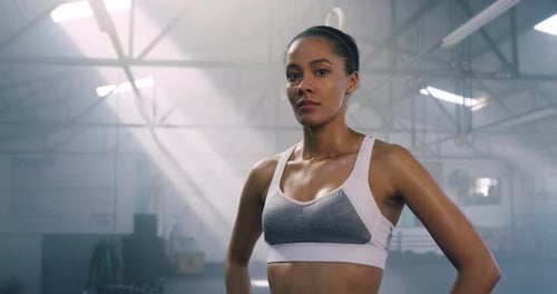 Sweaty Woman Resting After Workout in Gym