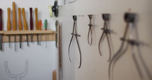 Video of tools hanging on walls in traditional carpentry workshop
