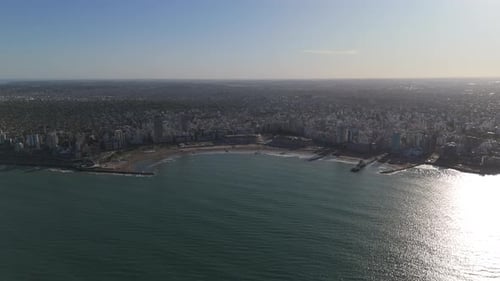 Wide aerial view of urban development in coastal resort town of Mar del Plata, Argentina. 4k.
