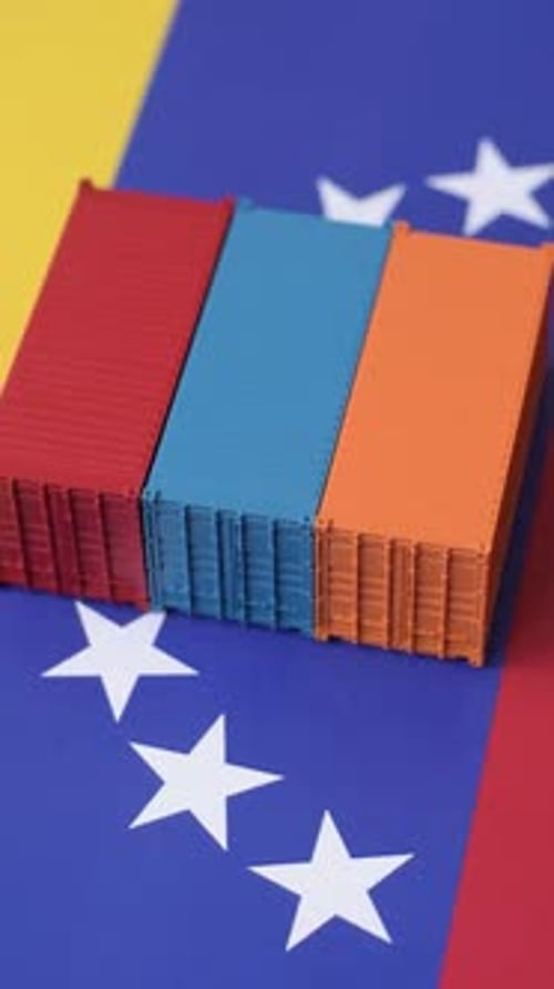 Cargo containers on the Venezuela flag, conceptual backdrop for goods logistics. Cargo containers