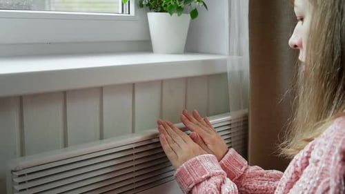 Young Frozen Woman Wearing a Sweater Shaking and Freezing for Winter Cold with Shock Expression on