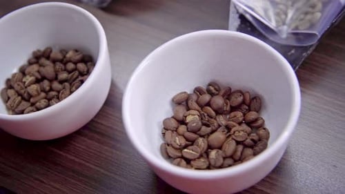 working in a cocoa factory toasting the cocoa beans.