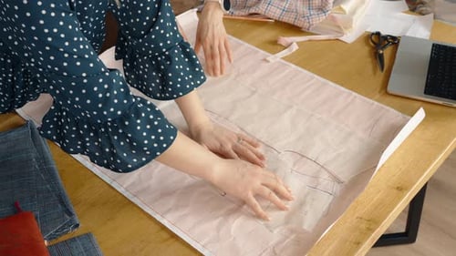 Designer Working With Sewing Pattern Close Up