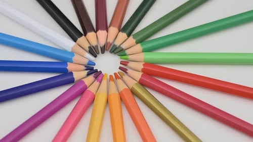 Colorful Pencils Rotate As Sun Rays Background Rainbow Pencils for Drawing Assortment of Colored