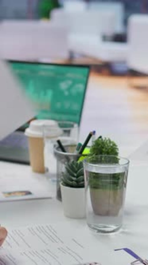 Vertical Video Job Candidate Hands Over His CV to Team of HR Professionals to Start Interview