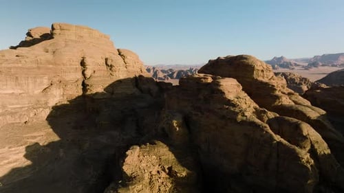 Magnificent Aerial Views Of The Rocky Mountains In Wadi Rum Desert In Jordan - aerial shot