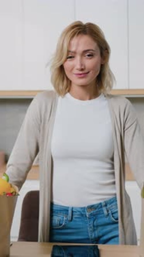 Portrait Attractive Woman Chef Wearing Short Smiling with Joy at Camera Stand By Kitchen Near Paper