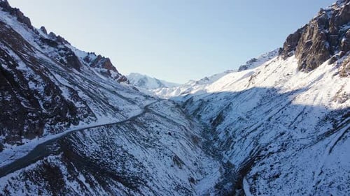 Aerial of Snowy Mountain Range with Snow