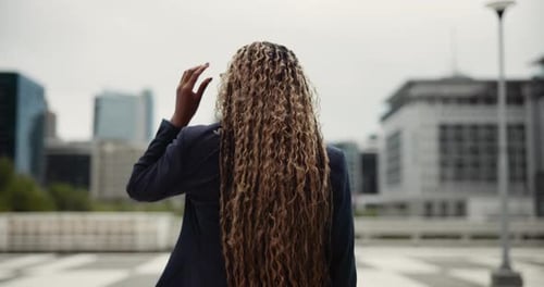 Back, glasses and walking with lawyer woman outdoor in city for morning commute to court location