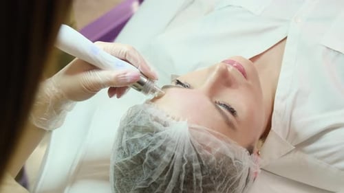 Cosmetology Clinic Facial Skin Care Procedures Using Modern Equipment Closeup