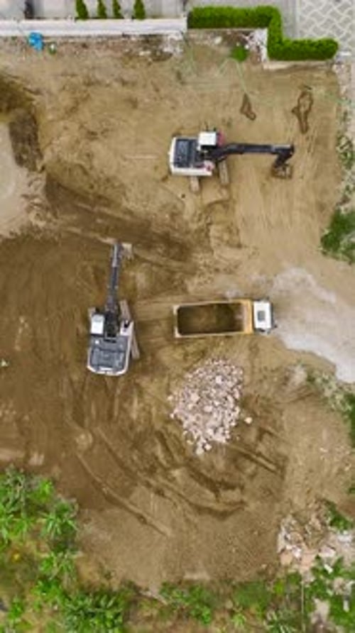 Aerial View of Construction Site with Machinery