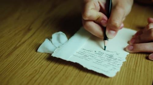 Close Up of Letter Writing on Paper