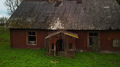 Aerial View of Abandoned Rural House in Countryside