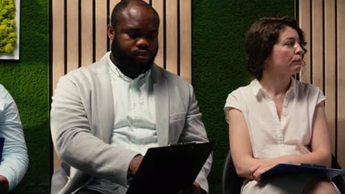 Professional Diverse Candidates Awaiting Start of Job Interview