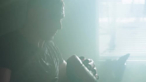 Man Boxing and Working Out at the Gym