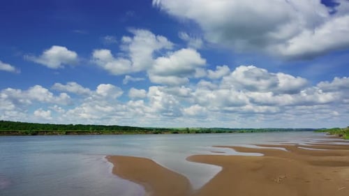 Clouds Over River Landscape