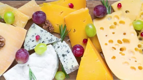 Artisanal Cheese Variety with Grapes and Walnuts