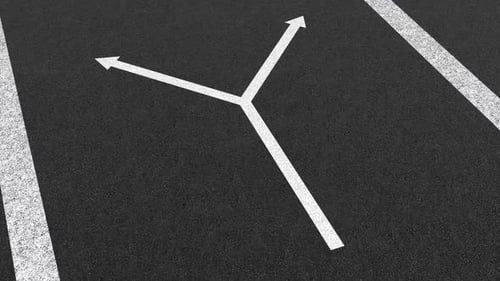 Directional Arrows on Asphalt Parking Lot