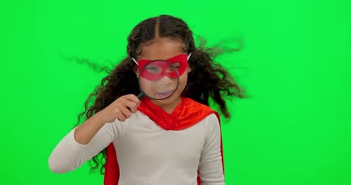 Search, green screen and girl child in studio with a superhero costume for halloween or a mission