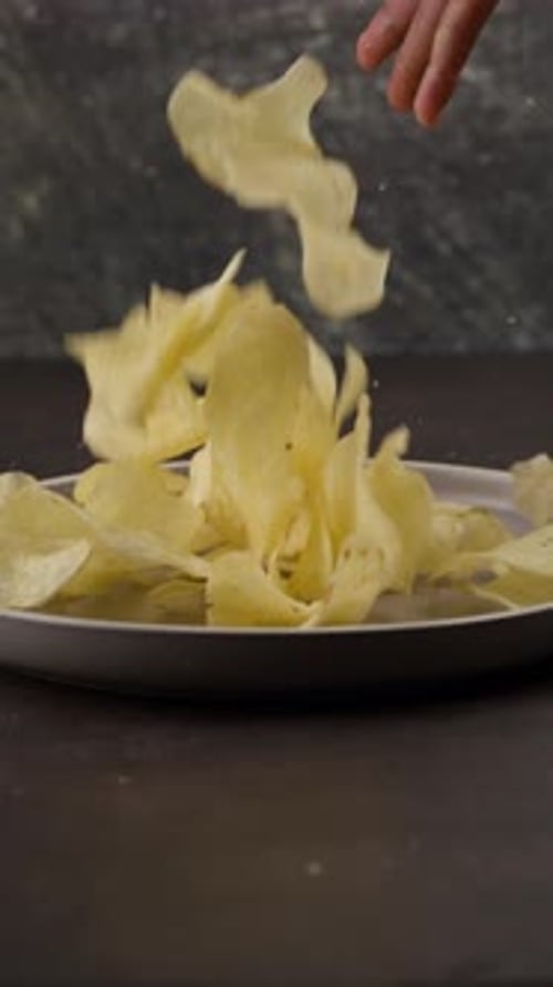 Vertical Food Video, Round French Fries Falling In Slow Motion