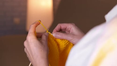 Hands Knitting Bright Yellow Yarn Indoors Craft Hobby
