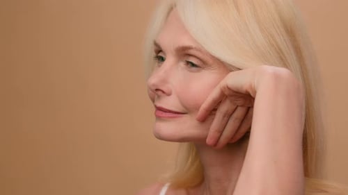 Close Up Female Wrinkly Smooth Tighten Face Caucasian Mature Senior 50s Old Woman Touch Perfect