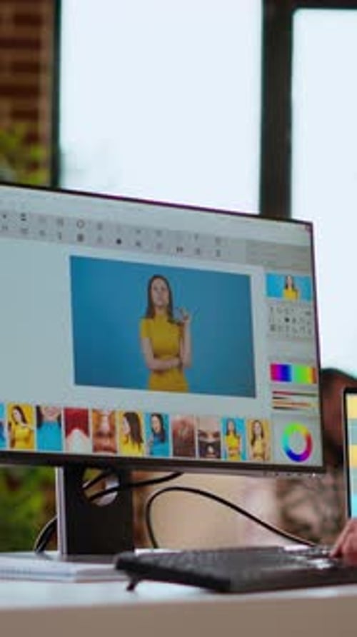 Vertical Video Freelance Designer Works on a Photo Editing Project in a Remote Office