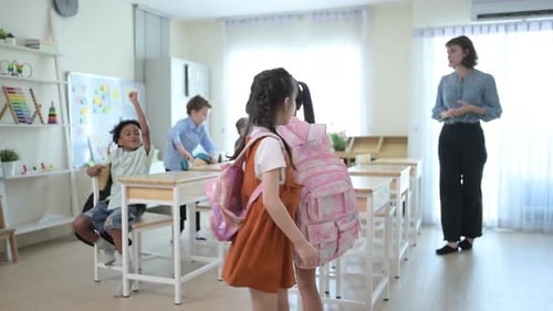 Teacher and students, In the morning to begin learning and studying in a classroom of school.
