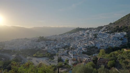 Bird'seye viewAction A Beautiful Landscape and a View of the City with Small Houses Which is Located