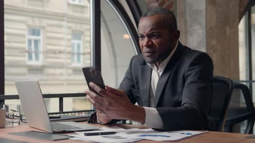 Happy Business Winning with Phone African American Businessman Mobile Win Man in Office Online
